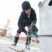Washtenaw County Community College Culinary student Katie makes a sown man out of ice using a chainsaw during Saline's Winterfest Saturday Jan. 26th.
Courtney Sacco I AnnArbor.com 